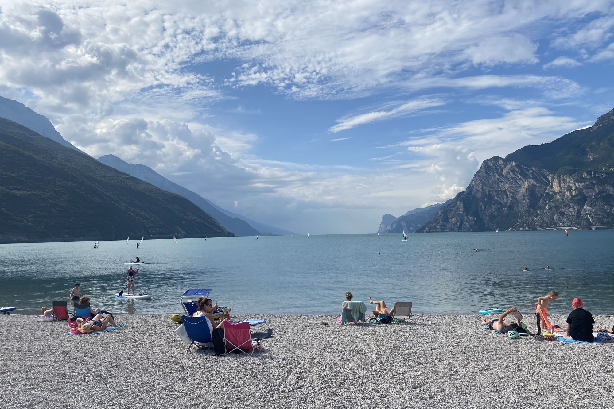 Sunbathing on the beach in Torbole on Lake Garda