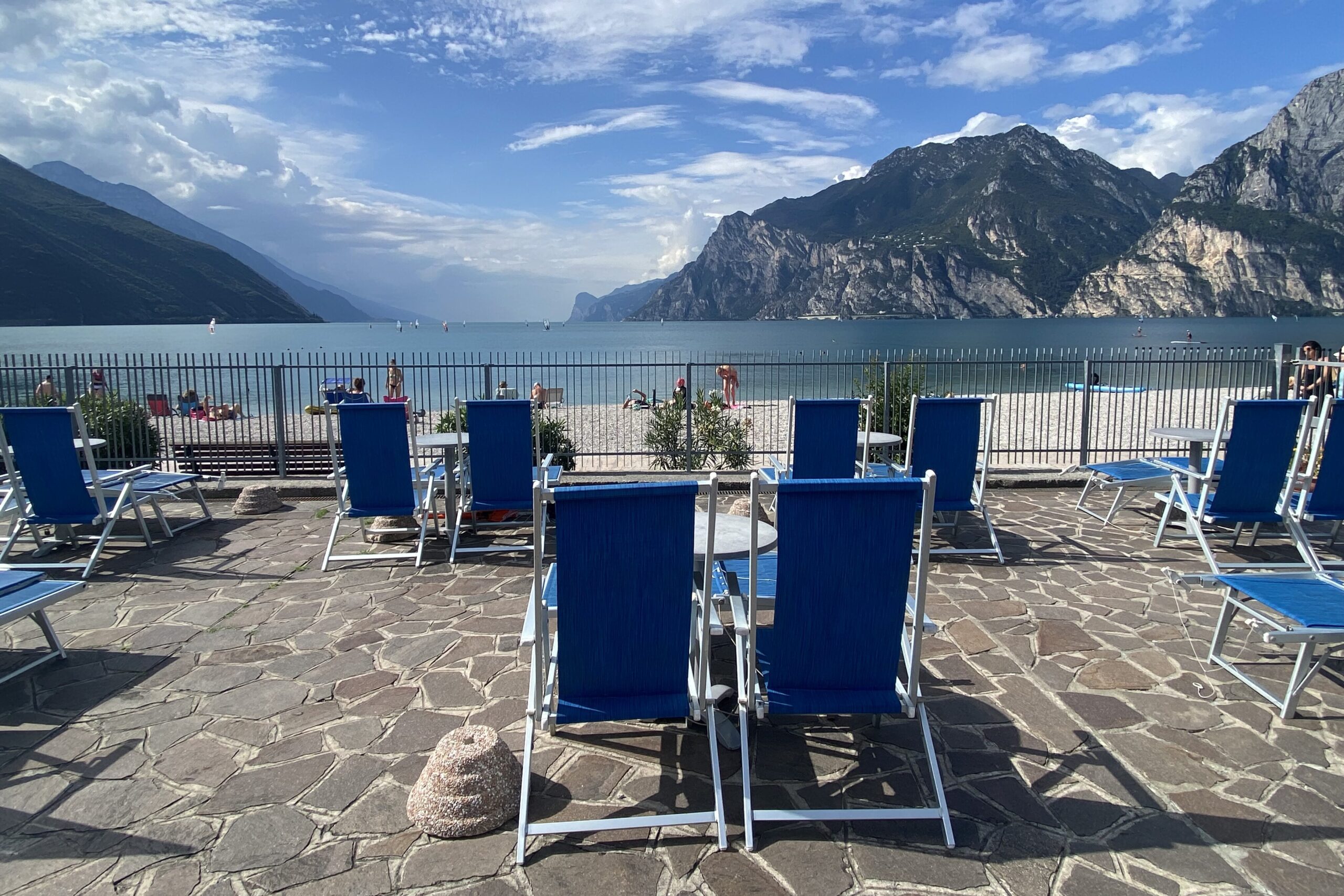 Lakeside terrace with dedicated chairs for each apartment