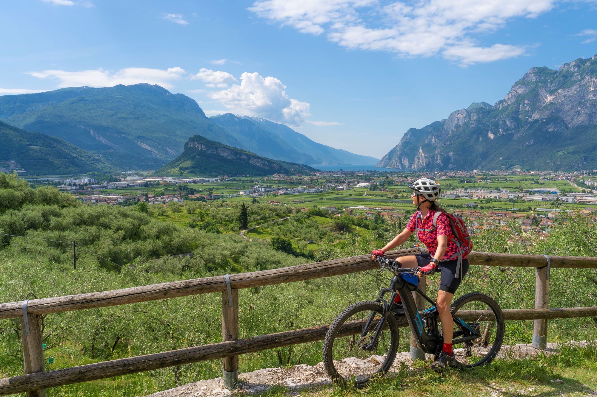 Mountain biking through scenic trails by Lake Garda