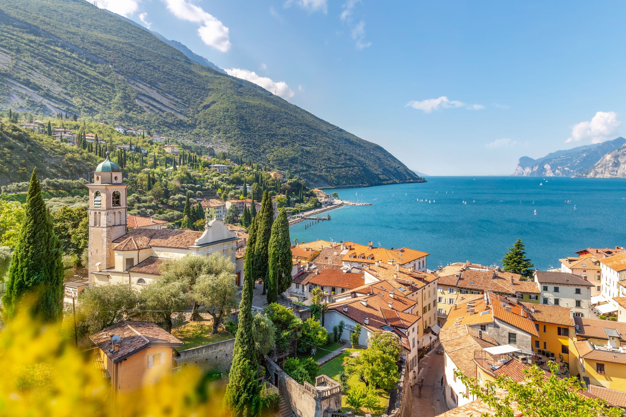 Discover Torbole on Lake Garda: A perfect destination for water sports and stunning landscapes.